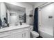 Bathroom featuring a marble countertop, a shower with curtain doors, and neutral decor at , Odessa, FL 33556