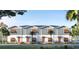 Four-unit townhome building with attractive, muted colors at 13750 Park Blvd # 5, Seminole, FL 33776