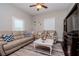 Spacious living room with hardwood floors, neutral colors, and comfortable seating at 1814 E 15Th Ave, Tampa, FL 33605