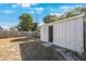 White storage shed in backyard at 2434 18Th N Ave, St Petersburg, FL 33713