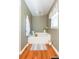 Soaking tub with wooden floors and plenty of counter space at 25028 Hyde Park Blvd, Land O Lakes, FL 34639