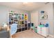 Bright home office with built-in shelving and desk at 25028 Hyde Park Blvd, Land O Lakes, FL 34639