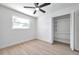 Bright bedroom closet with built-in shelves at 3145 Fiesta Dr, Dunedin, FL 34698