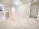 Open loft area with carpeted floors at 3314 Fresno Pl, Zephyrhills, FL 33541