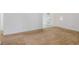 Bright living room with wood-look tile floor at 4838 Longwood Ave, Holiday, FL 34690