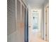 Hallway with light walls and access to bedrooms at 4859 Independence Dr, Bradenton, FL 34210