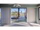 Sunroom with water views and tile floors at 4859 Independence Dr, Bradenton, FL 34210