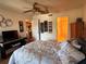 Bedroom with a queen-size bed, and view of the bathroom and kitchen at 506 Lennox W Rd # 506, Palm Harbor, FL 34683