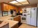 Well-equipped kitchen with ample cabinetry and modern appliances at 506 Lennox W Rd # 506, Palm Harbor, FL 34683