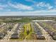 Aerial view of houses, landscaping, and a park at 6807 King Creek Dr, Sun City Center, FL 33573