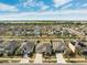 Aerial view of a community with houses and landscape at 6807 King Creek Dr, Sun City Center, FL 33573