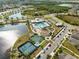 Aerial view of community amenities including pool and courts at 6807 King Creek Dr, Sun City Center, FL 33573