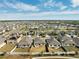 Aerial view of houses in a residential neighborhood at 6807 King Creek Dr, Sun City Center, FL 33573