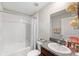 Bathroom with tub shower combination and single vanity at 6807 King Creek Dr, Sun City Center, FL 33573