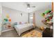 bedroom with full-size bed, toys and colorful decor at 6807 King Creek Dr, Sun City Center, FL 33573