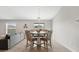 Bright dining area with table and chairs, view to backyard at 6807 King Creek Dr, Sun City Center, FL 33573