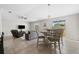 Bright dining area with table and chairs, view of backyard at 6807 King Creek Dr, Sun City Center, FL 33573