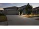 Well-maintained house with a landscaped lawn, driveway and garage at 6807 King Creek Dr, Sun City Center, FL 33573