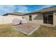 Concrete patio with grill and space for outdoor furniture at 6807 King Creek Dr, Sun City Center, FL 33573