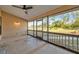 Relaxing screened porch overlooking backyard at 9502 59Th E Ave, Bradenton, FL 34202