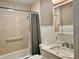 Clean bathroom with a shower/tub combo and updated vanity at 1003 Beverly Ave, Largo, FL 33770