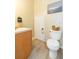 Updated bathroom with toilet and vanity at 10068 Old Haven Way, Tampa, FL 33624