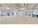 Large basement with high ceilings, abundant space, and potential for customization at 10101 Eagle Preserve Dr, Englewood, FL 34224