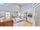Spacious kitchen boasting sleek cabinetry, stainless steel appliances, and ample countertop space for cooking at 10101 Eagle Preserve Dr, Englewood, FL 34224