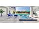 Inviting outdoor pool and spa with lounge chairs, framed by a covered patio and lush greenery at 10101 Eagle Preserve Dr, Englewood, FL 34224