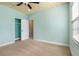 Light and airy bedroom with ceiling fan and walk-in closet at 12005 Whistling Wind Dr, Riverview, FL 33569