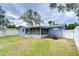 Landscaped backyard with patio, shed and fenced yard at 14723 54Th N Way, Clearwater, FL 33760