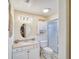 Clean bathroom with shower and granite countertop at 1806 Wedge Ct, Sun City Center, FL 33573