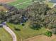 Aerial view of property near farmlands at 3106 E Trapnell Rd, Plant City, FL 33566