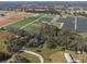 Aerial view showcasing house and surrounding area at 3106 E Trapnell Rd, Plant City, FL 33566