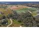 Aerial view of property with farmland in background at 3106 E Trapnell Rd, Plant City, FL 33566