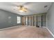 Bedroom with large closet and neutral carpeting at 3106 E Trapnell Rd, Plant City, FL 33566