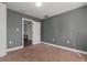 Spacious bedroom with neutral walls, carpeting, and a closet at 3106 E Trapnell Rd, Plant City, FL 33566