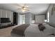 Spacious bedroom with large bed, TV, and closet at 3106 E Trapnell Rd, Plant City, FL 33566