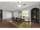 Dining room with table, chairs, and area rug at 3106 E Trapnell Rd, Plant City, FL 33566