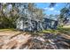 Front view of a charming blue house at 3106 E Trapnell Rd, Plant City, FL 33566