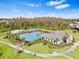 Community lap pool and recreation area with walking paths at 32627 Abby Lax Ln, Wesley Chapel, FL 33543