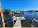 Wooden dock with access to the canal at 3410 Minnow Creek Dr, Hernando Beach, FL 34607