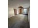 Unfinished bedroom with concrete flooring at 3703 N 55Th St, Tampa, FL 33619