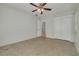 Spacious bedroom with ceiling fan and closet at 3766 Benson N Ave, St Petersburg, FL 33713