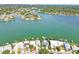 Aerial view of waterfront home with private dock and access to waterways at 518 20Th Ave, Indian Rocks Beach, FL 33785