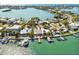 Aerial view of waterfront homes, showcasing a desirable community at 518 20Th Ave, Indian Rocks Beach, FL 33785