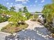 Single-Gathering home with boat and lush tropical landscaping at 518 20Th Ave, Indian Rocks Beach, FL 33785