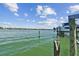 Tranquil water view with boat lift and calm waters at 518 20Th Ave, Indian Rocks Beach, FL 33785