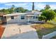 House exterior with driveway and landscaping at 5418 10Th Ave S, Gulfport, FL 33707