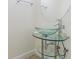 Stylish powder room features glass bowl sink and a modern vanity at 5709 White Trillium Loop, Land O Lakes, FL 34639